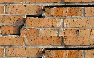 Brick wall with serious structural damage in Worcester, MA
